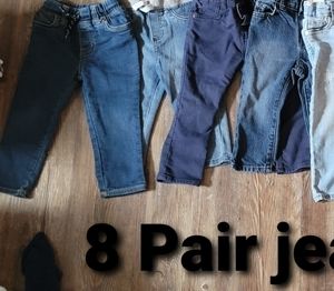 8 pair of Carters jeans